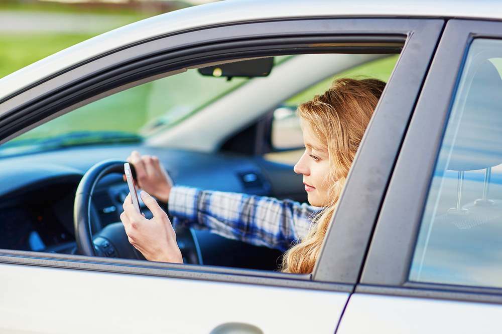¿Qué sucede si el otro conductor estaba enviando mensajes de texto durante un accidente de automóvil?