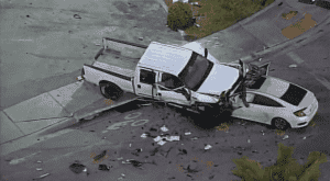 head on collision crash with truck and car