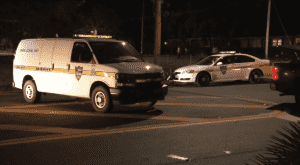 two cop cars on road