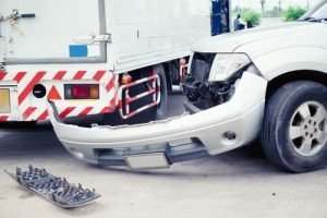 wrecked white car