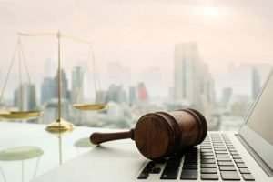 gavel on computer - lawsuit lawyer