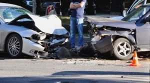 two badly wrecked cars