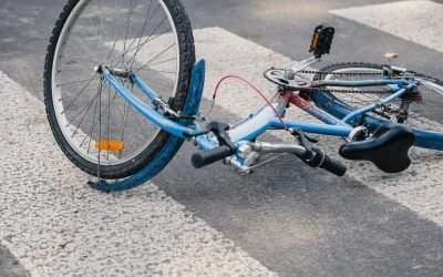 bicycle lying in a crosswalk