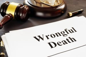 How are wrongful death settlements paid out